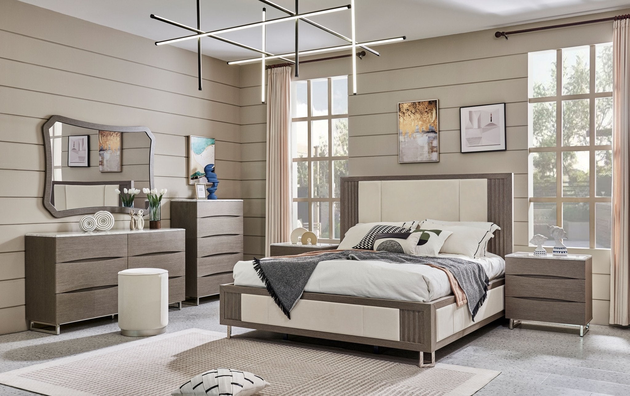 Modern bedroom with wooden furniture, including a bed, dressers, and nightstands.